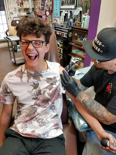 Explore angel number tattoo ideas, creative tattoo ideas in Highland, available at Fat Brothers Productions