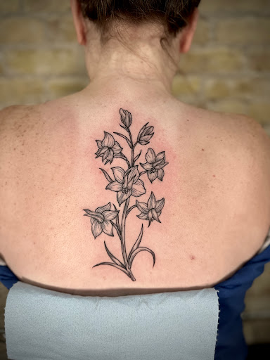 Explore rock tattoo ideas, creative tattoo ideas in Dillon, available at Lacuna Studios