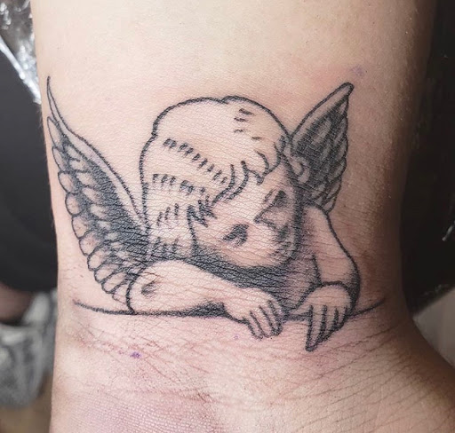 Explore tattoo ideas roman numerals, creative tattoo ideas in Keyport, available at Taboo Tattoos
