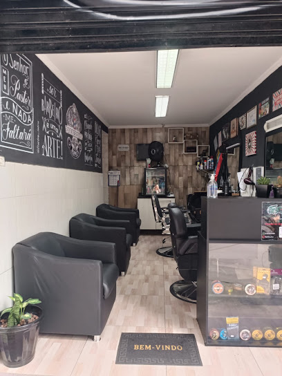 Logo da empresa - Barbearia Nunee's