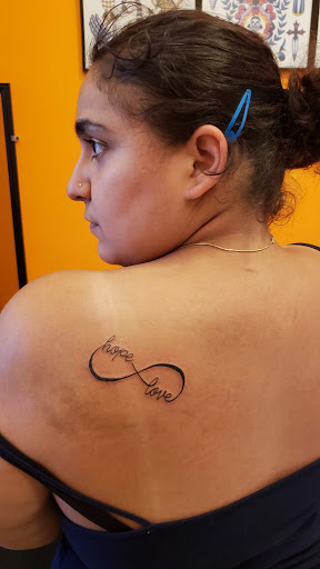 Explore apple tattoo ideas, creative tattoo ideas in Jamaica Plain, available at Fat Rams Pumpkin Tattoo