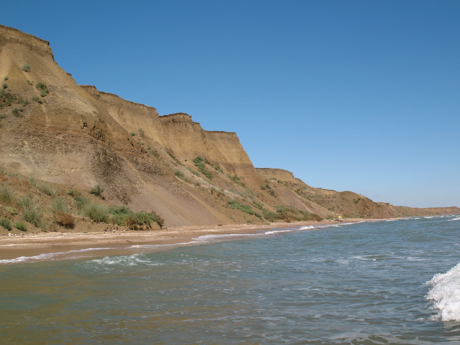 Fotografija Plazh Oazis z dolga ravna obala