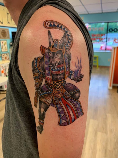 Explore large thigh tattoo ideas, creative tattoo ideas in Houghton Lake, available at Screaming Eagle Tattoo