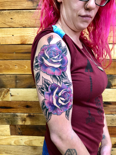 Explore skull tattoo ideas for men, creative tattoo ideas in Mansfield, available at The Marksman Tattoo Company