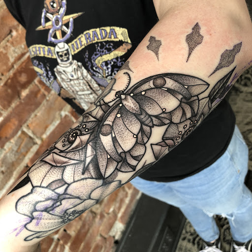 Explore name tattoo ideas on chest, creative tattoo ideas in Savannah, available at tattoos by delan