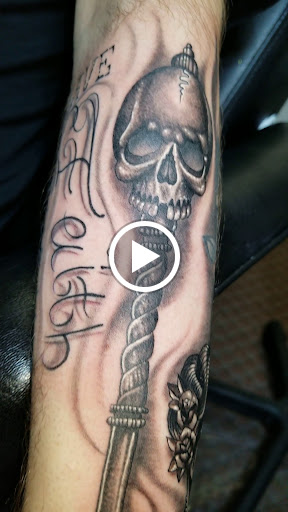 Explore lip tattoo ideas for men, creative tattoo ideas in Angola, available at Hoodlum Ink