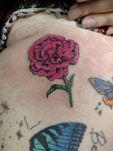 Explore tattoo cover up ideas on neck, creative tattoo ideas in Owosso, available at Twisted ink tattoo