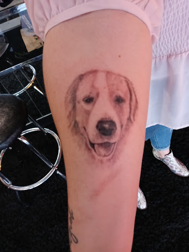 Explore dog love tattoo ideas, creative tattoo ideas in Abilene, available at Downtown Tattoo