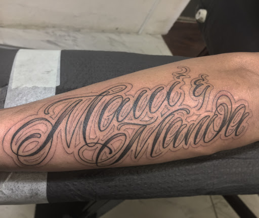 Explore bicep tattoo ideas for men, creative tattoo ideas in Wahiawa, available at Empire Art Studio