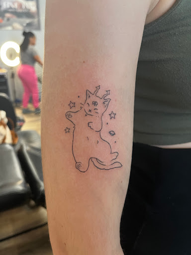 Explore head tattoo ideas for guys, creative tattoo ideas in Davenport, available at Fine Ink Studios Tattoos