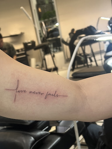 Explore cover up ideas for name tattoos, creative tattoo ideas in Orange, available at Baron Art Tattoo