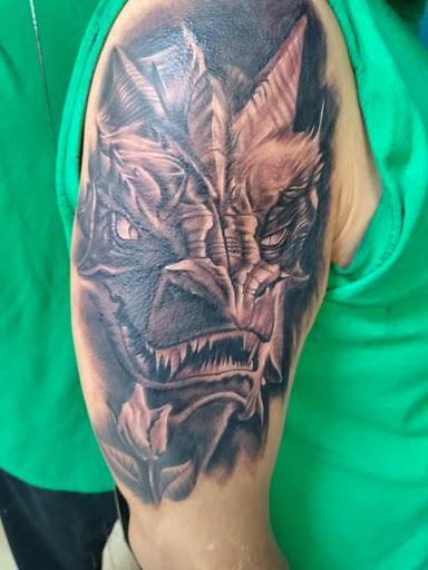 Explore tattoo ideas strong woman, creative tattoo ideas in Hereford, available at Slow Pain Tattoo Body Art Studio