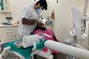 DR AHUJA ' S TOOTH CARE image