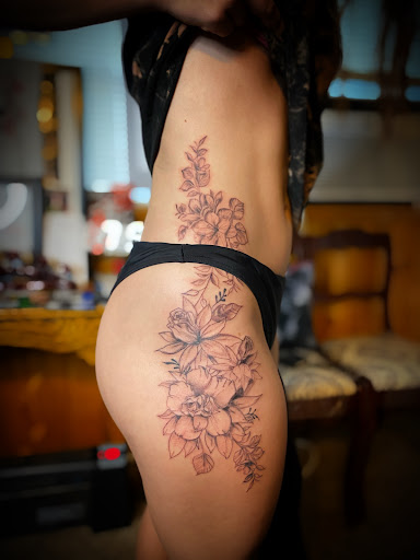 Explore women's hip tattoo ideas, creative tattoo ideas in Moweaqua, available at Fleshwound Tattoo