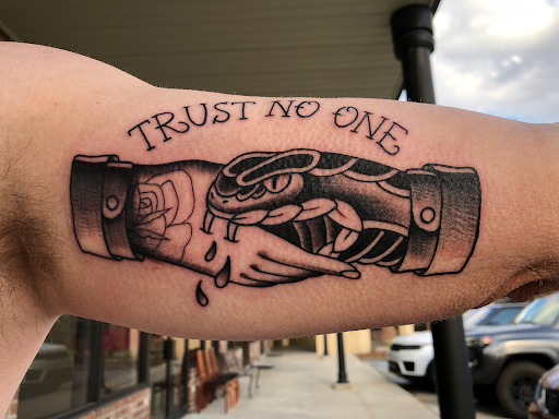 Explore poke and stick tattoo ideas, creative tattoo ideas in Prairieville, available at Nolana Tattoo & Piercing
