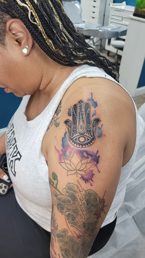 Explore insect tattoo ideas, creative tattoo ideas in Buford, available at Wild Tribe Tattoos and Piercings