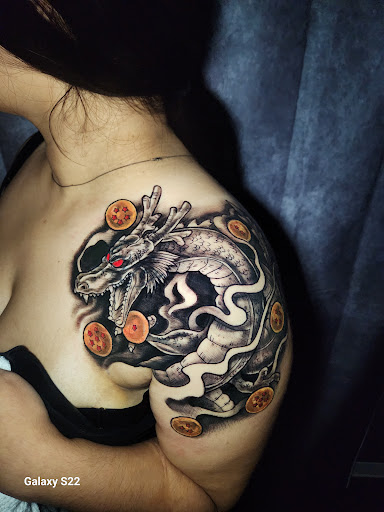 Find tattoo ideas snake for your next unique tattoo in Buford at Inked Arts Tattoo Studio