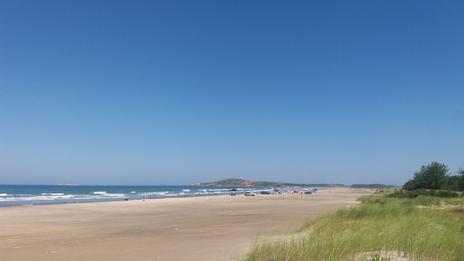 Foto van Praia do Sol met recht en lang