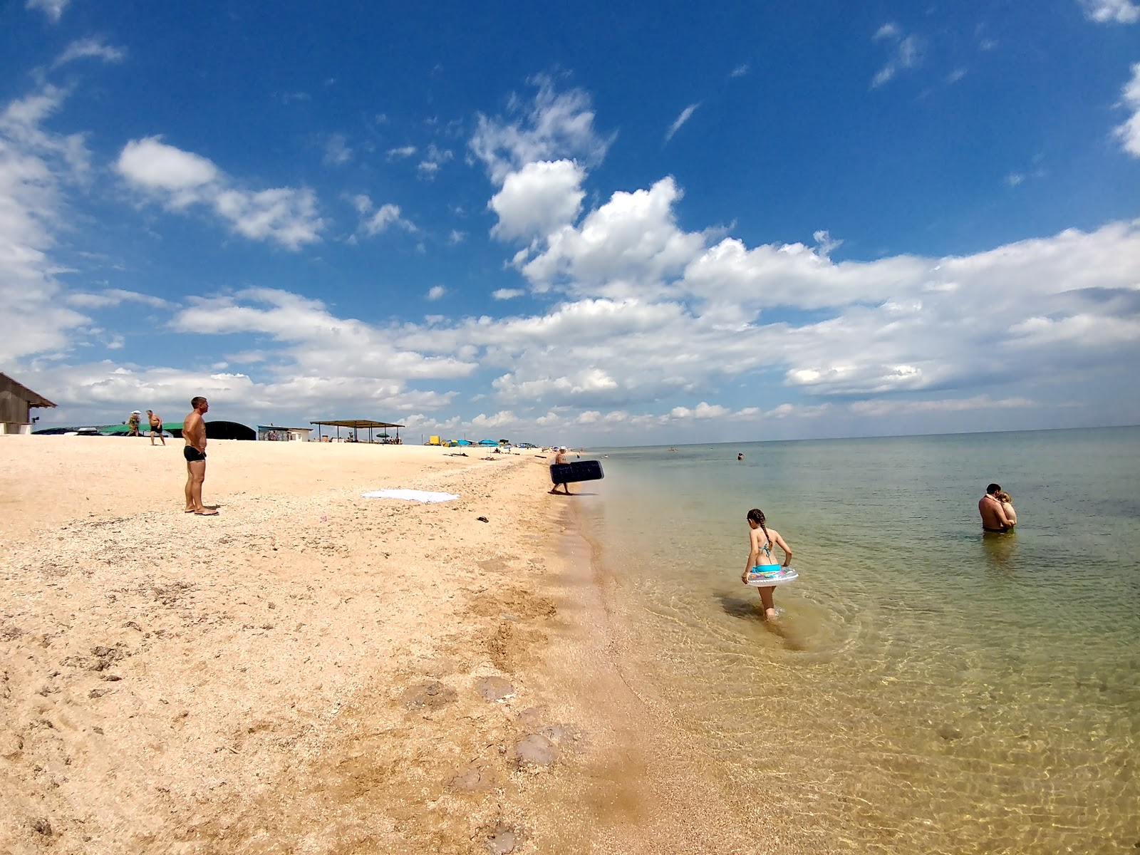 Foto von Plyazh Zatyshok mit heller muschelsand Oberfläche