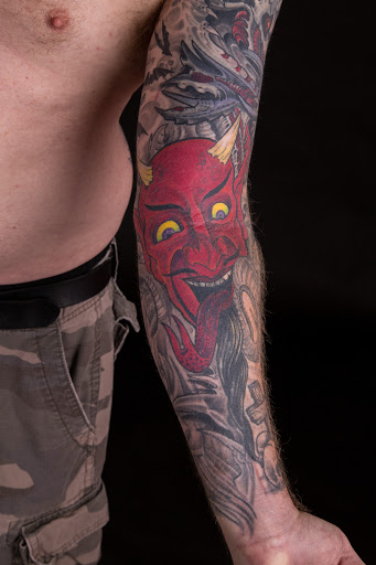 Explore outside forearm tattoo ideas, creative tattoo ideas in Conway, available at Hero Tattoo