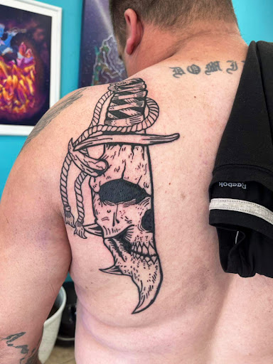 Explore rose tattoo ideas for guys, creative tattoo ideas in Scranton, available at Black Sheep Tattoo & Piercing Studio