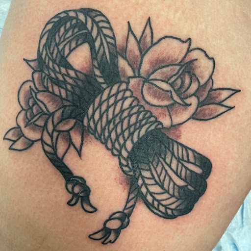 Explore opium tattoo ideas, creative tattoo ideas in Buffalo, available at True Gloom Tattoo Studio