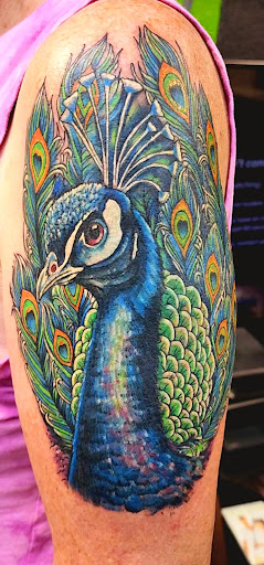 Explore tattoo ideas for women thigh, creative tattoo ideas in Redding, available at DEADLIFT TATTOO