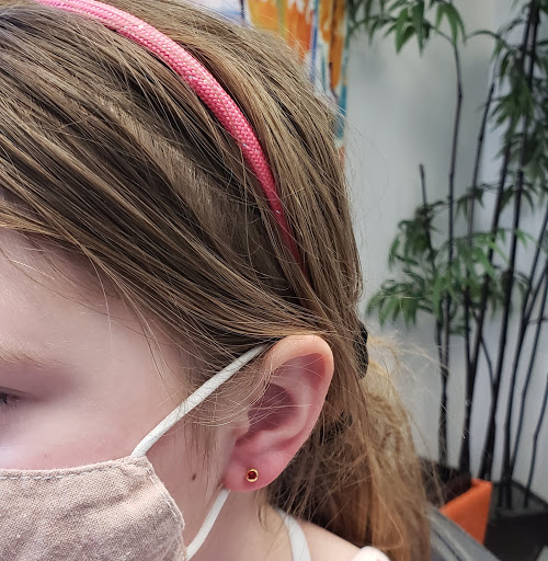 Explore feminine arm tattoo ideas, creative tattoo ideas in Bellevue, available at Just Your Ears Piercing & Permanent Jewelry Studio