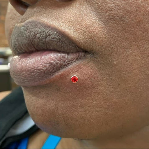 Explore inner bicep tattoo cover up ideas, creative tattoo ideas in Charleston, available at Exotic Impressions Body Piercing