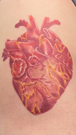 Explore illuminati tattoo ideas, creative tattoo ideas in San Diego, available at Sideshow Tattoo and Piercing