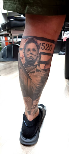 Explore long thin tattoo ideas, creative tattoo ideas in Largo, available at Alchemy Tattoos and Body Piercings