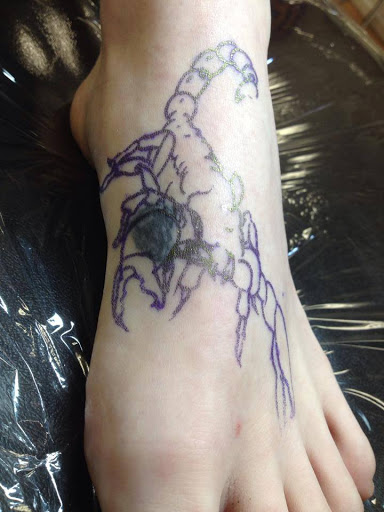 Tattoo Shop «Red Room Social Club Emporium», reviews and photos, 115 W Nepessing St, Lapeer, MI 48446, USA