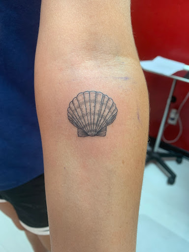 Find angel tattoo ideas for females for your next unique tattoo in Naples at Body Branding Tattoo Emporium