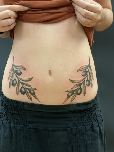 Explore halloween pumpkin tattoo ideas, creative tattoo ideas in Wakefield, available at Wakefield Tattoo