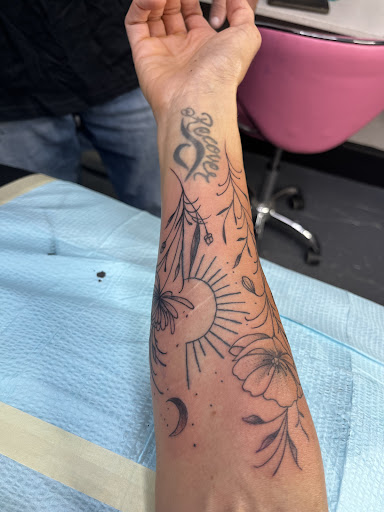 Explore ladies neck tattoo ideas, creative tattoo ideas in Myrtle Beach, available at Elite Ink Tattoos of Myrtle Beach