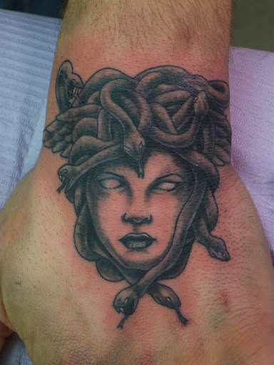 Explore ideas for elbow tattoos, creative tattoo ideas in Hebron, available at Explosive Ink Tattoo