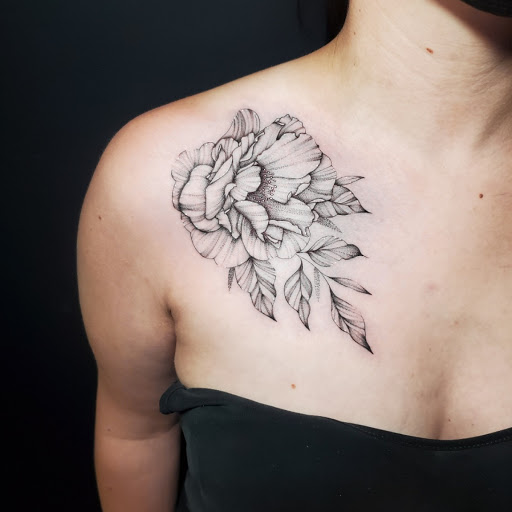 Explore country tattoo ideas for females, creative tattoo ideas in Stevens Point, available at International Ink Tattoos