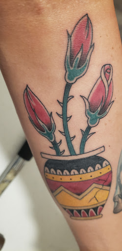 Find male tattoo ideas shoulder for your next unique tattoo in Boise at Born Weird Walk in Tattoo and Piercing