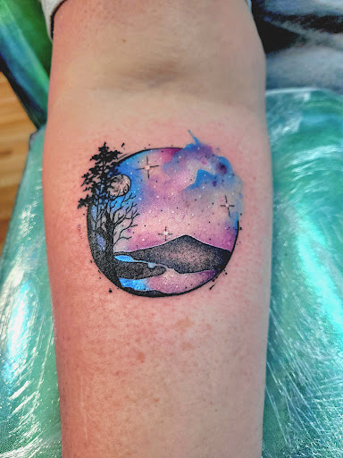 Explore small frog tattoo ideas, creative tattoo ideas in Benton, available at Spectrum Tattoo