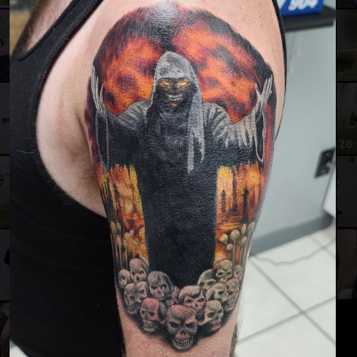 Explore black power tattoo ideas, creative tattoo ideas in Myrtle Beach, available at Myrtle Beach Ink