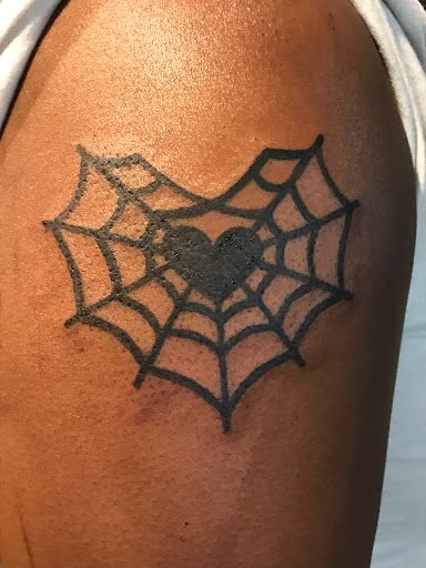 Explore feminine tattoo sleeve ideas, creative tattoo ideas in Clarksville, available at Dark Raine Tattoo