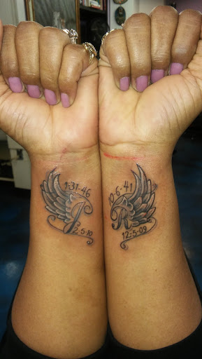 Tattoo Shop «Liquid Tattoo», reviews and photos, 16583 Old U.S. 27, Lansing, MI 48906, USA