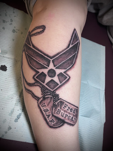 Explore thor's hammer tattoo ideas, creative tattoo ideas in Calumet, available at Tattooing by Big Ben