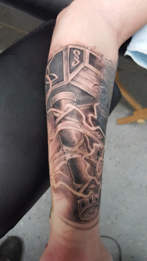 Explore yellow rose tattoo ideas, creative tattoo ideas in Wichita, available at Body Canvas Tattooing