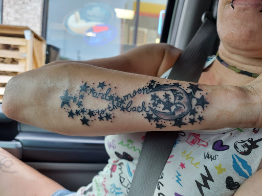 Explore black and white tattoo ideas, creative tattoo ideas in Smithville, available at Revelation Ink