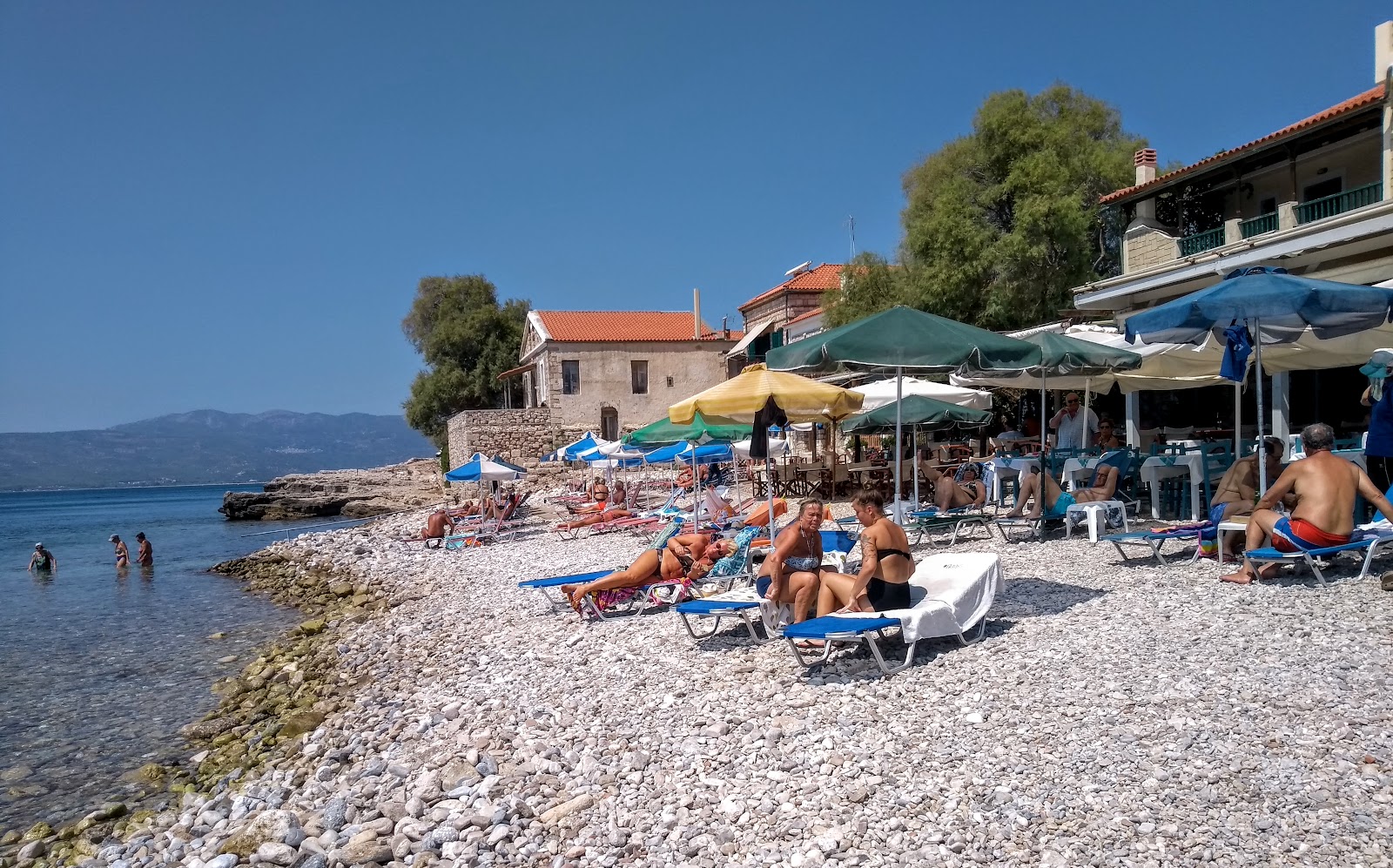 Tarsanas Beach'in fotoğrafı düz bir kıyı şeridi ile birlikte