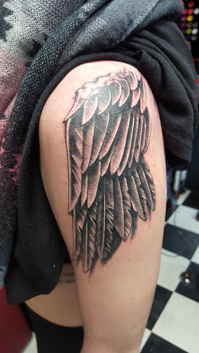 Explore face tattoo ideas for women, creative tattoo ideas in Bristol, available at Black Sparrow Tattoo Studio