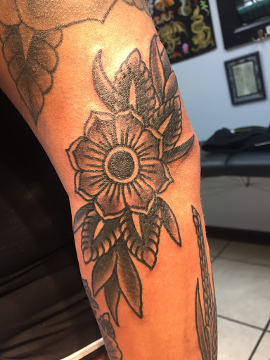 Explore word tattoo ideas for guys, creative tattoo ideas in Neptune, available at Neptune Tattooville