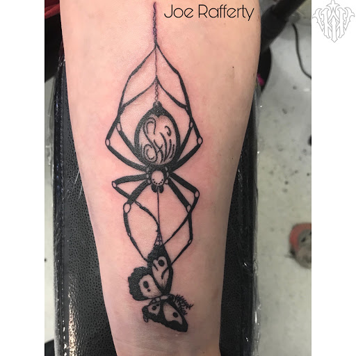 Explore feminine back tattoo ideas, creative tattoo ideas in Kent, available at War Horse Ink