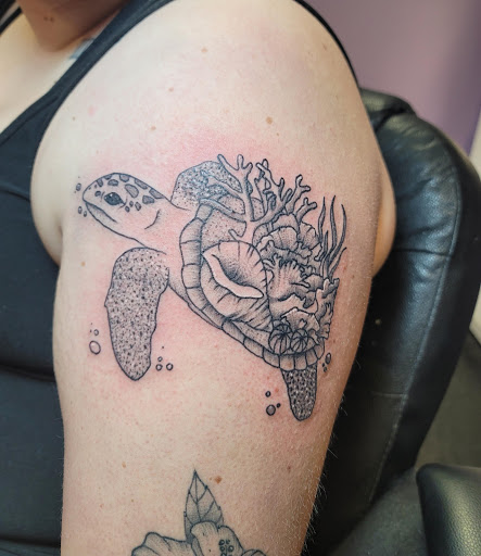 Explore rip cross tattoo ideas, creative tattoo ideas in Easley, available at Peach Pit Tattoo
